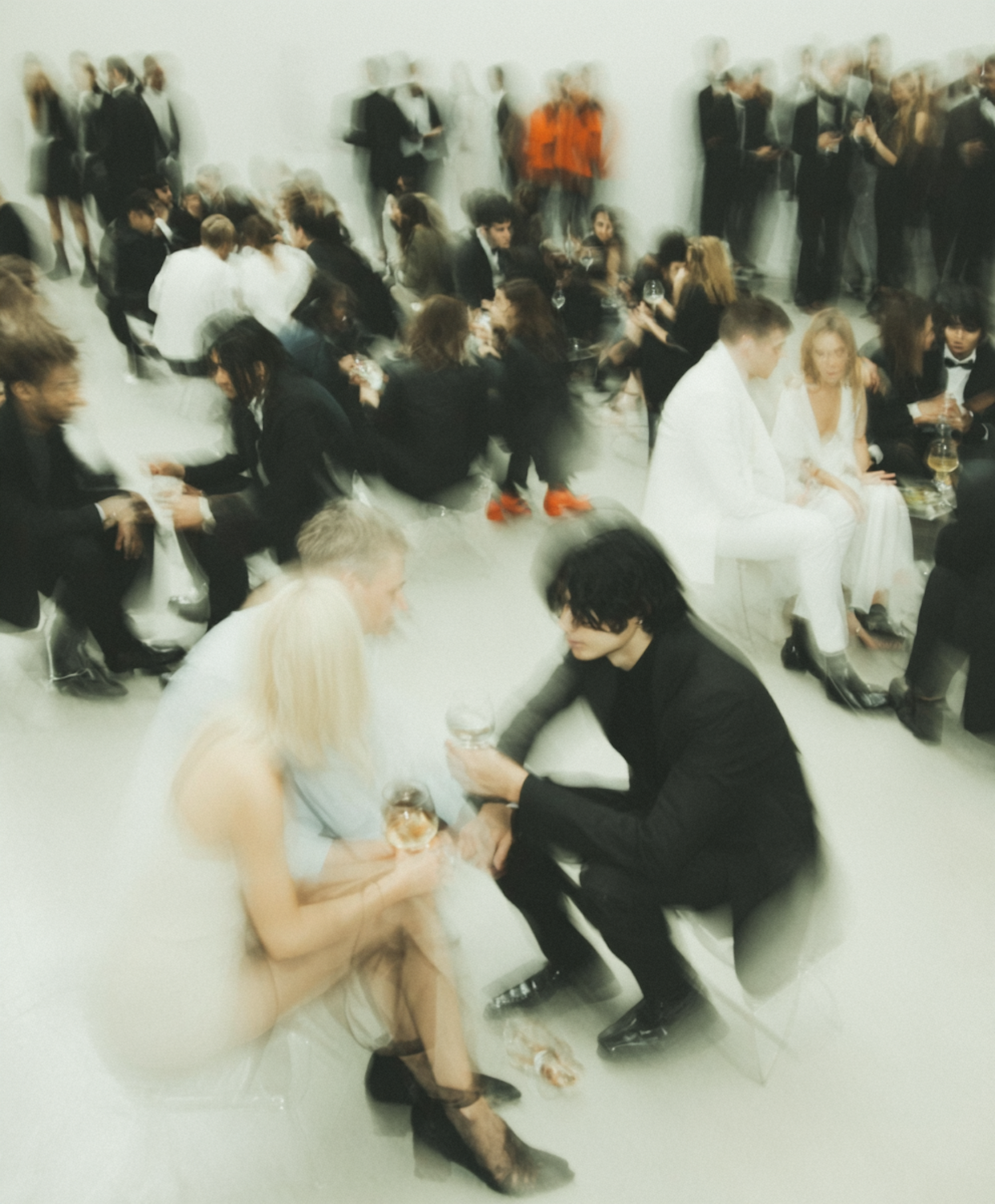 Designers engaging in conversation at a local meetup, emphasizing the importance of networking for career advancement.