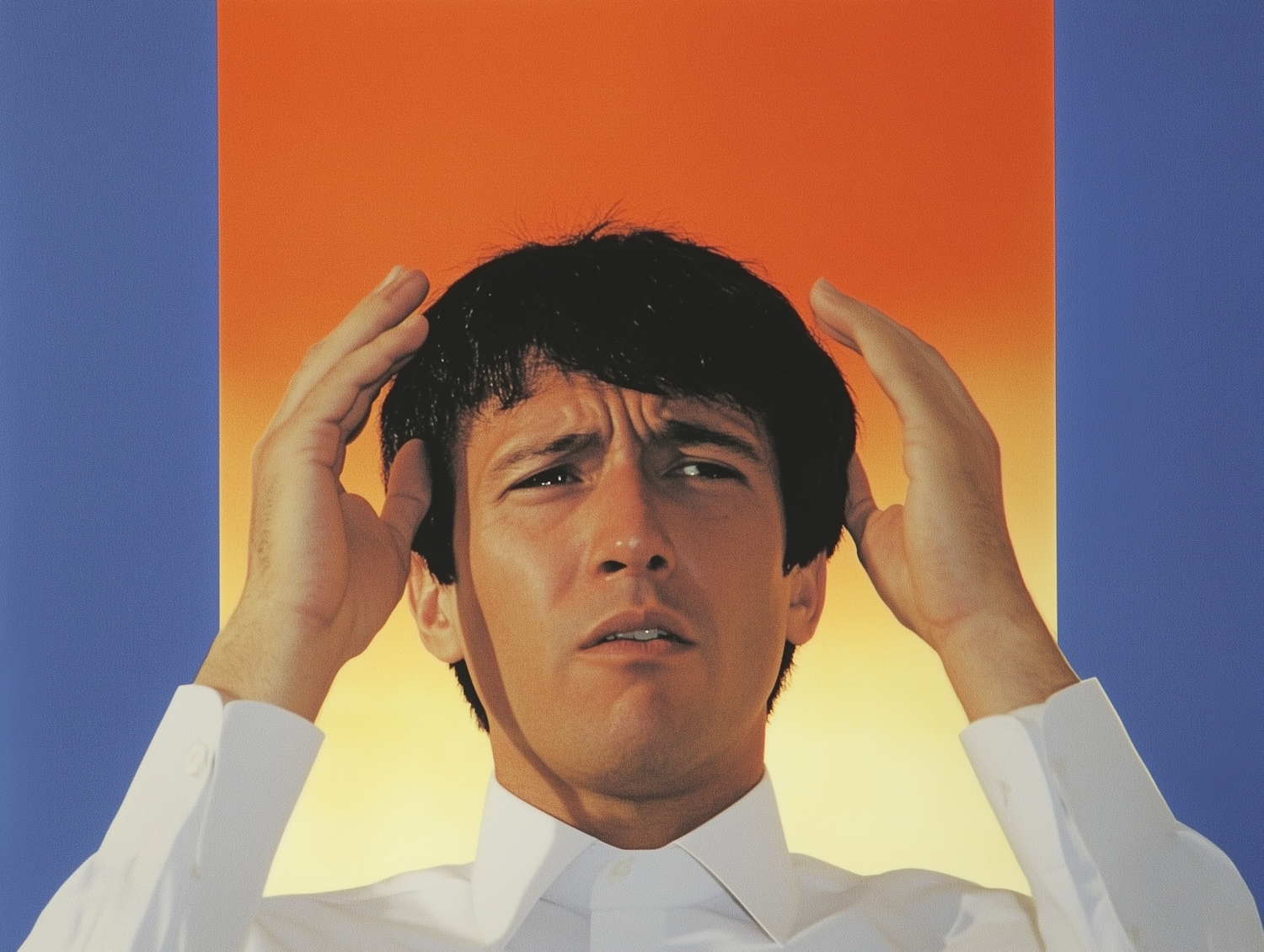 A person expresses frustration while trying to navigate a complex or unhelpful website, reflecting the common experience with 'useless' business sites.