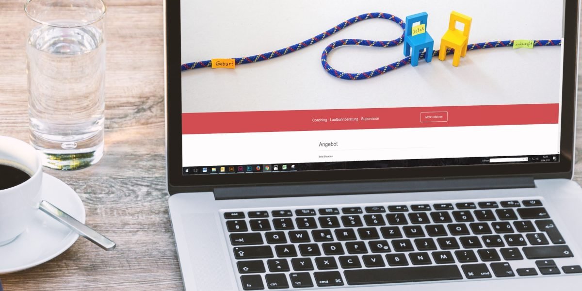 A small business owner thoughtfully reviews their current website, contemplating how to transform it from a static brochure into a dynamic lead-generating tool.