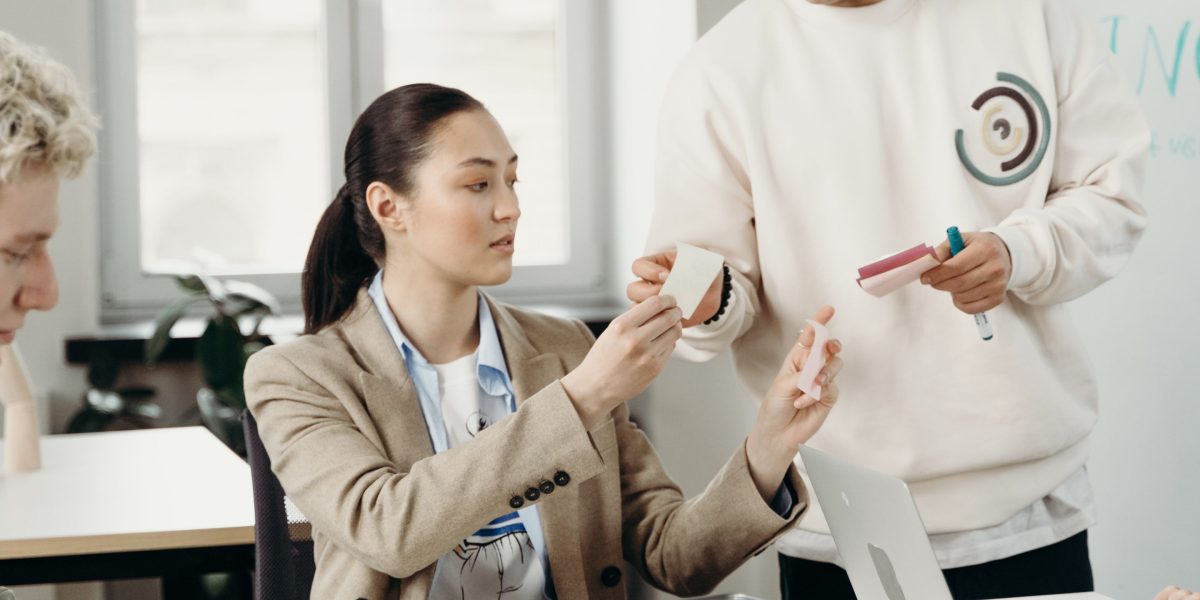 Professionals engage in a serious discussion, evaluating options and making important business decisions.